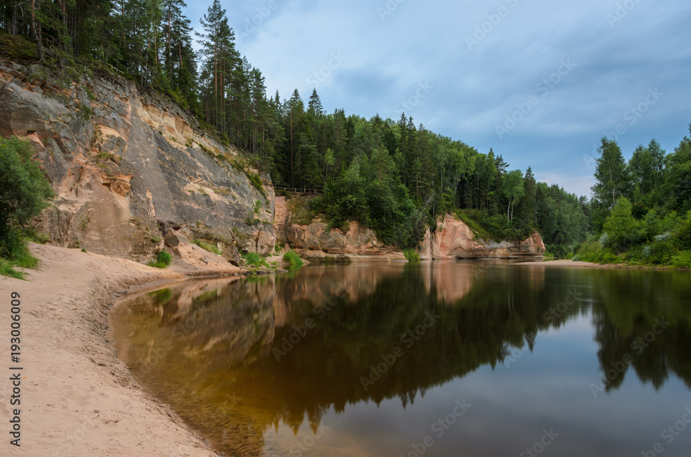 Sandstone outcrops. Erglu Cliffs, on the bank of the Gauja river. Sandstone outcrops. Erglu Cliffs, on the bank of the Gauja river.