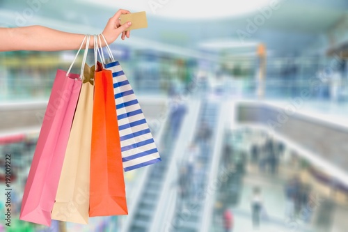 Woman hand with many shopping