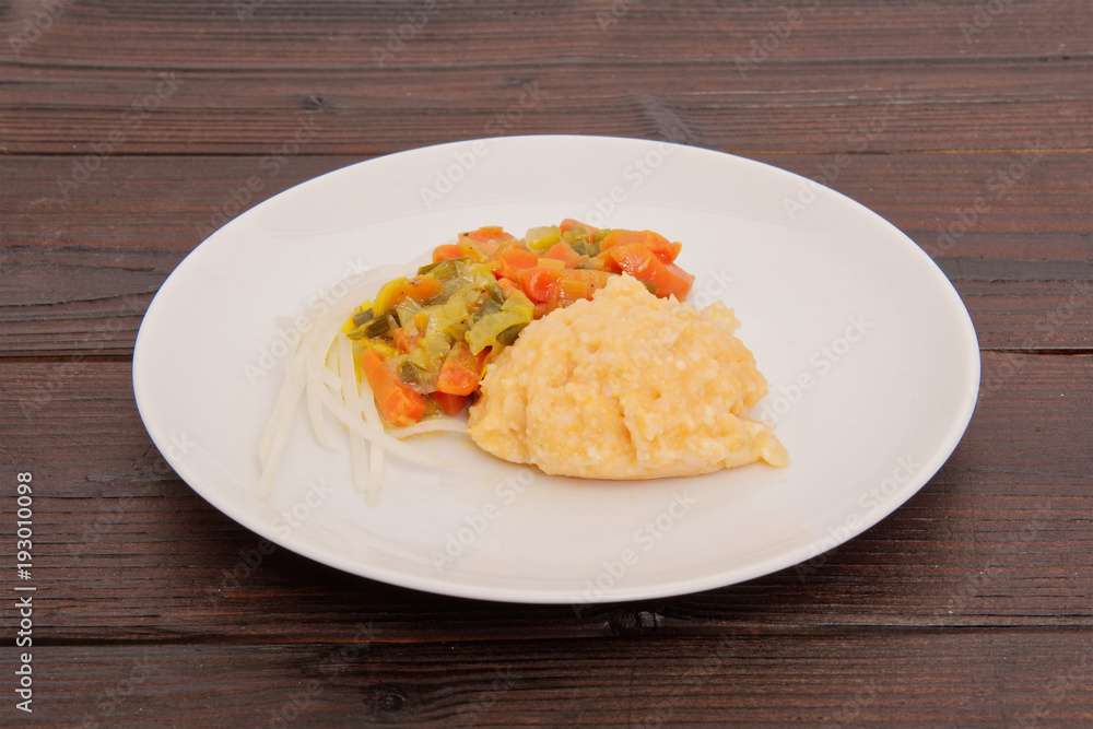 Rice sweet potato mash and vegetables on a table Rice sweet potato mash and vegetables on a table