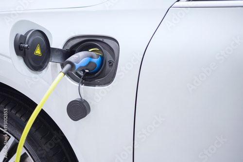 Charging an electric car with the power cable supply