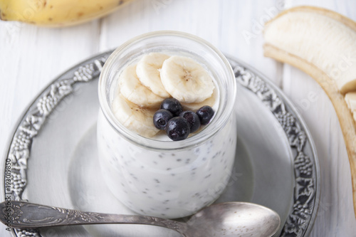 Yogurt with chia seeds and banana and blueberries