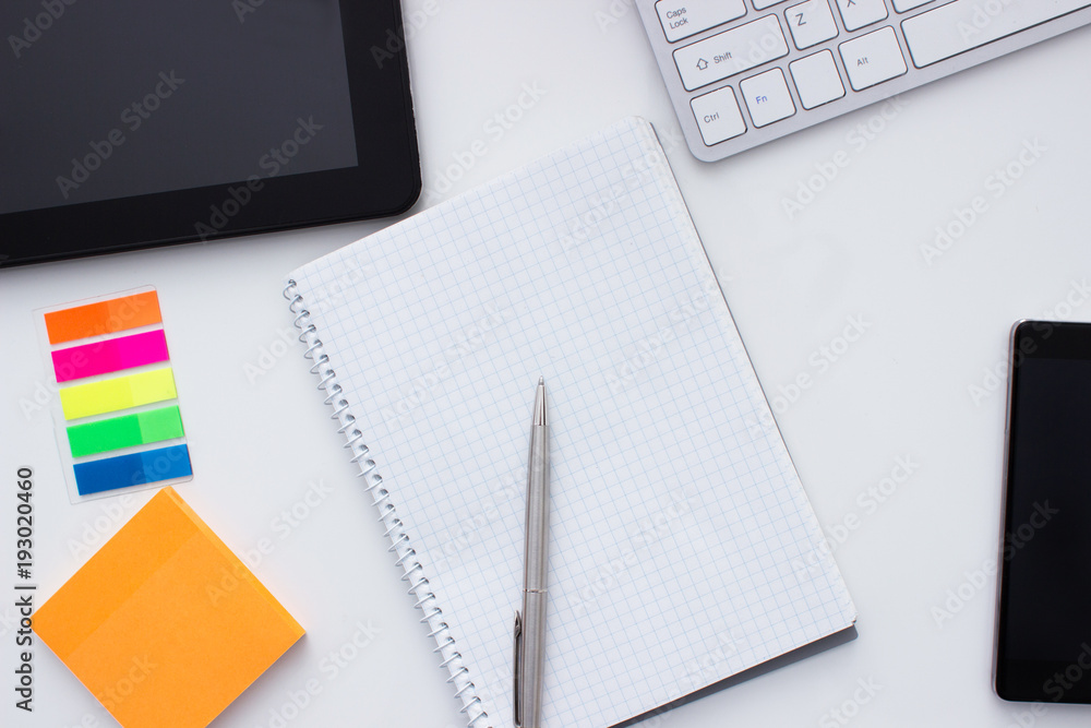 top view smartphone and tablet business concept notebook top view smartphone and tablet business concept notebook