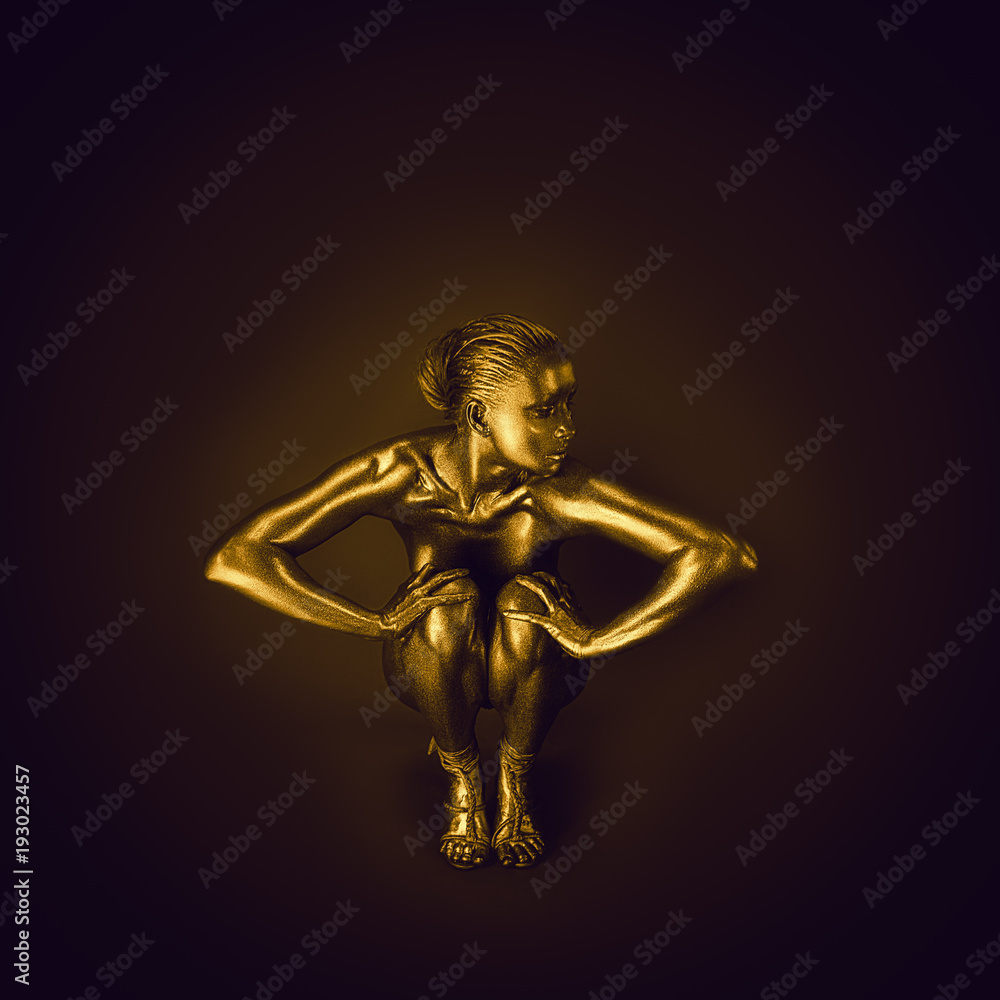 Golden lady on dark background