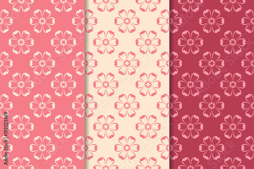 Set of cherry red floral designs. Vertical seamless patterns