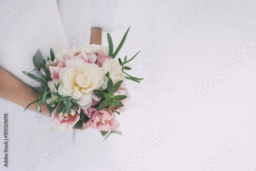 wedding bouquet in bride hands