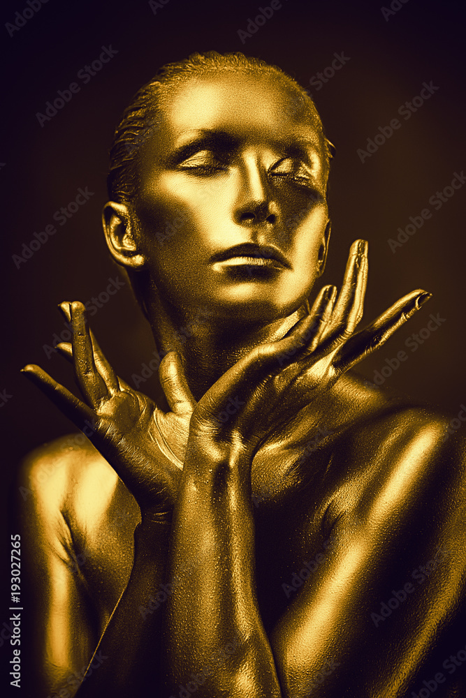 Fototapeta Golden lady on dark background
