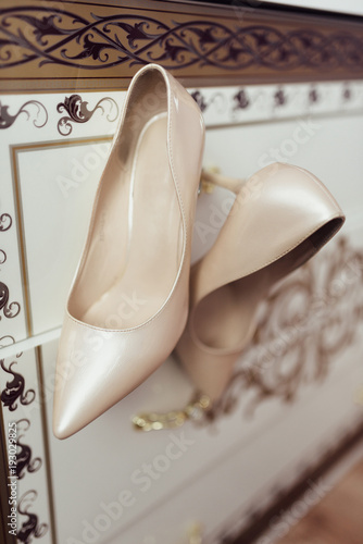 Bride's high heel shoes. Elegant bride shoes