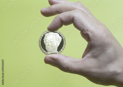 Virtual coins bitcoin holding hand 