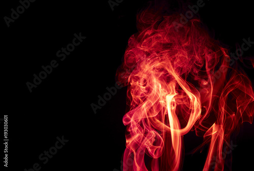 Fototapeta Naklejka Na Ścianę i Meble -  Red smoke on black background