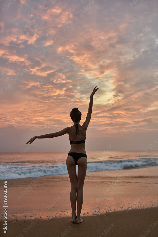 Girl posing on beach