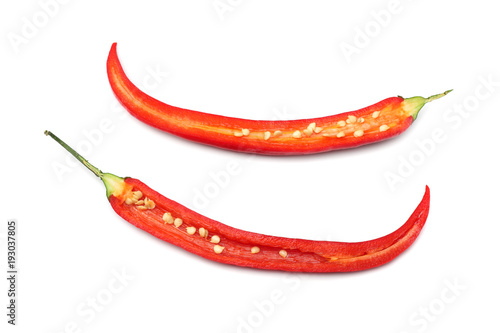 sliced red hot chili peppers isolated on white background