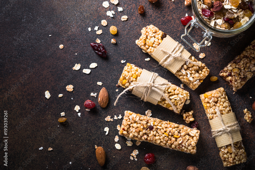 Granola bars on dark stone table. Top view. Granola bars on dark stone table. Top view.