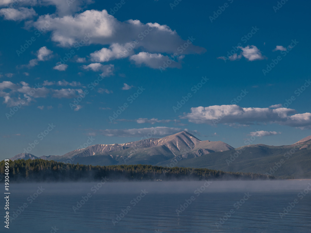 Lake With Mountains, Blue Sky and White Clouds Horizontal