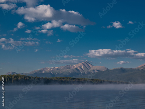 Lake With Mountains, Blue Sky and White Clouds Horizontal