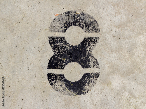 Number eight 8 on concrete wall background