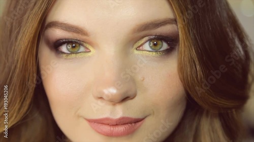 Wallpaper Mural Model poses on camera. Portrait of girl close-up with painted eyes Torontodigital.ca