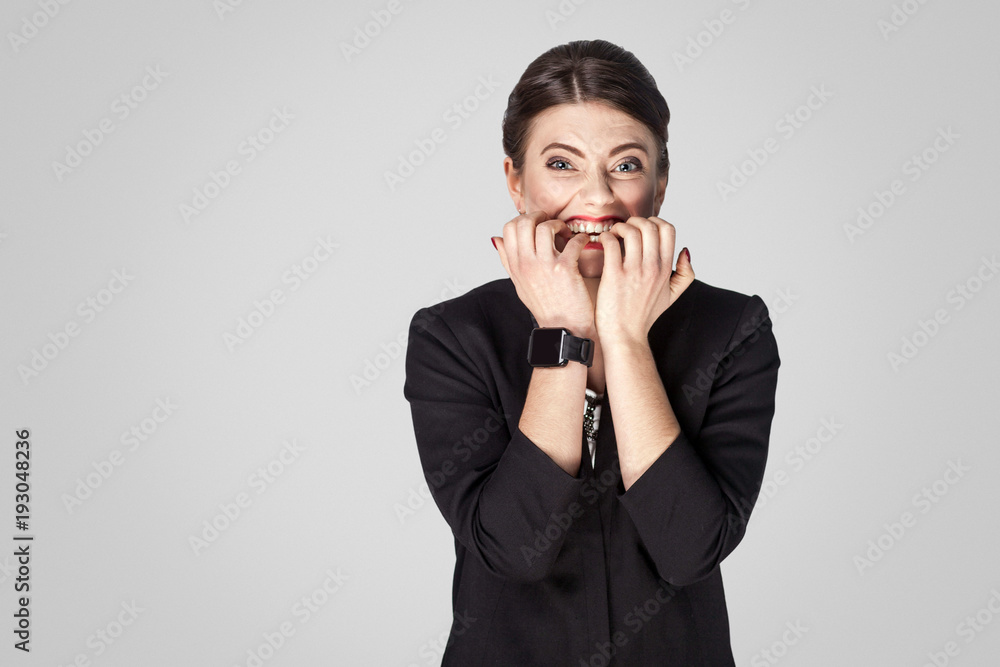 Worry woman looking at camera, closed mouth Worry woman looking at camera, closed mouth