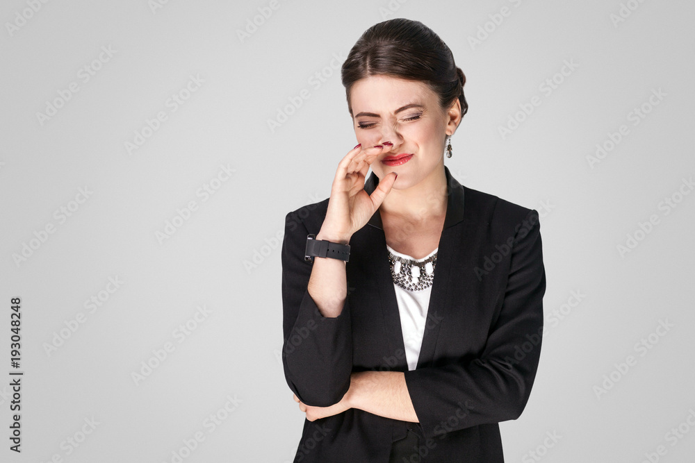 Fuu, bad smell. Unhappy business woman closed eyes Fuu, bad smell. Unhappy business woman closed eyes