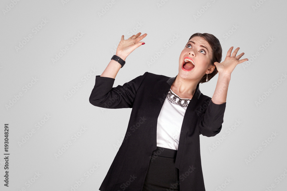 Fall on head. Shocked woman looking up and shout Fall on head. Shocked woman looking up and shout