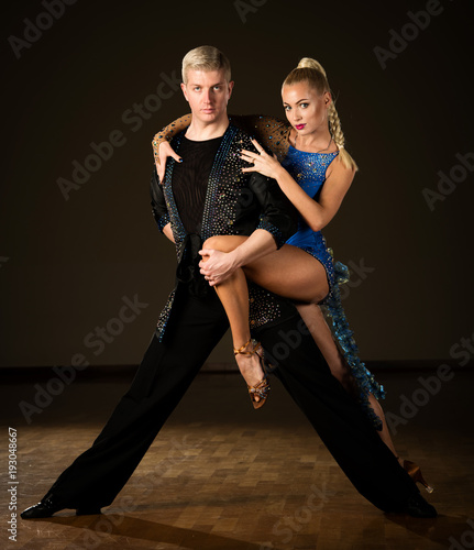 Beautiful professional latin dance couple preform exhibition dance