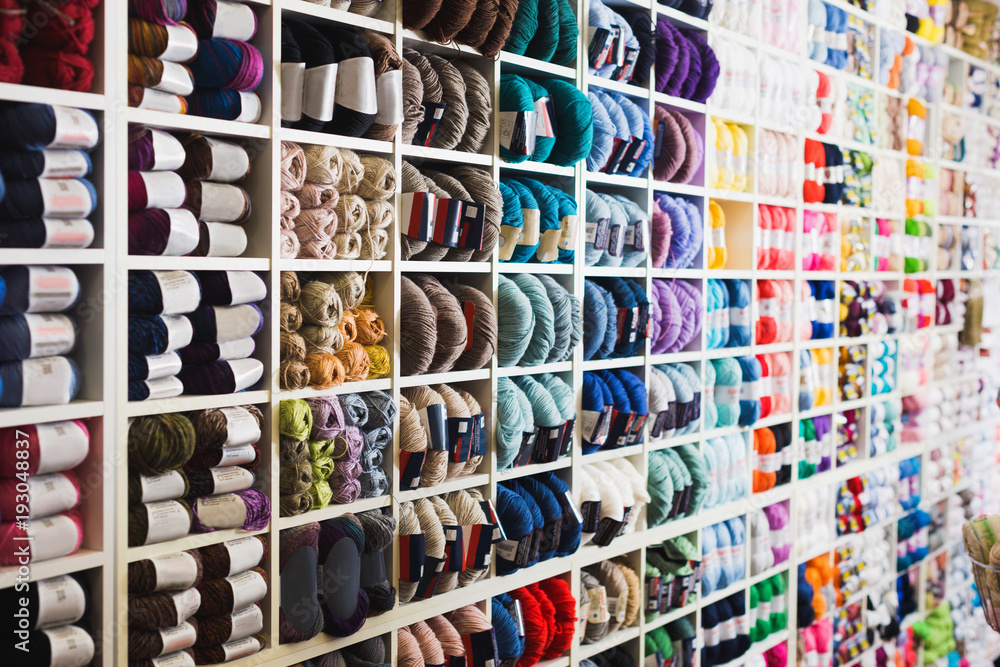 Variegated yarns for knitting on shop shelf