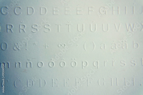 Embossed writing for blind people used before Braille writing system