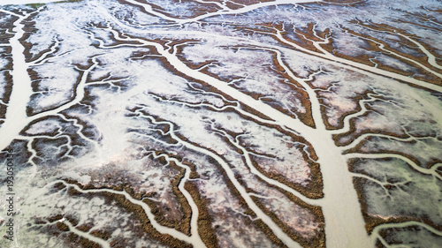 Drone view of a spectacular delta where a river flows into the sea