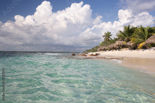 soft sea waves of turquoise water and white sand