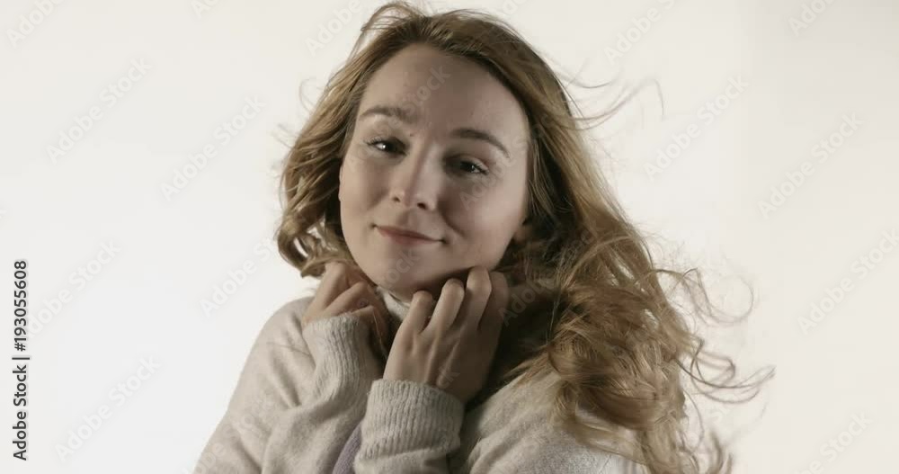 Portrait of beautiful blond woman with wool sweater Portrait of beautiful blond woman with wool sweater