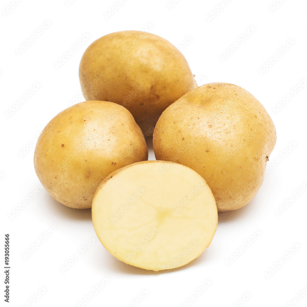 Young potatoes whole and slice isolated on white background. Harvest new. Flat lay, top view Young potatoes whole and slice isolated on white background. Harvest new. Flat lay, top view