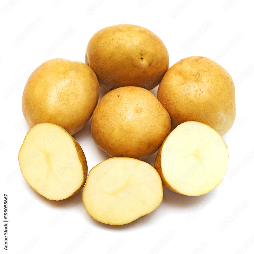 Young potatoes whole and slice isolated on white background. Harvest new. Flat lay, top view Young potatoes whole and slice isolated on white background. Harvest new. Flat lay, top view