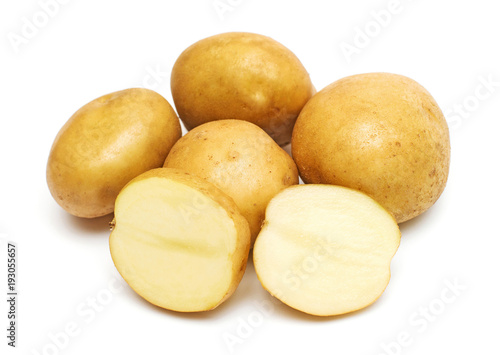 Young potatoes whole and slice isolated on white background. Harvest new. Flat lay, top view