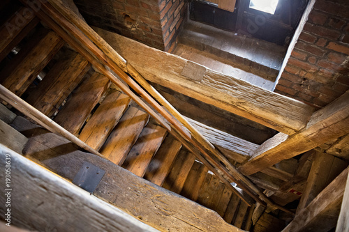 Old wooden staircase in the medieval tower.