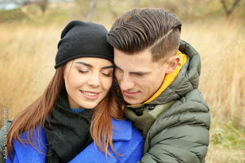 Beautiful couple in warm cl...