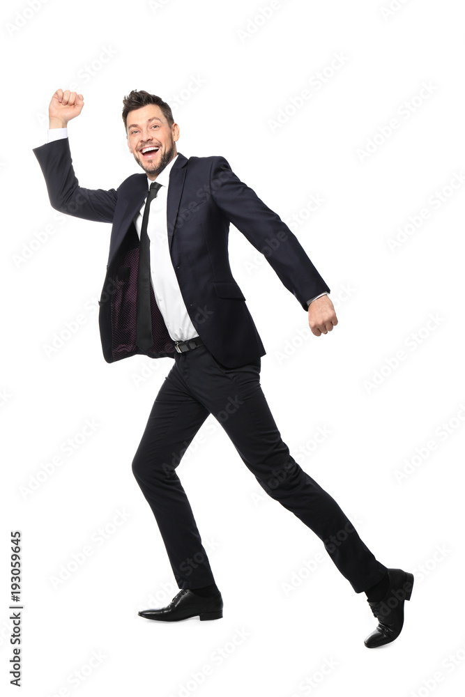 Young businessman running on white background Young businessman running on white background