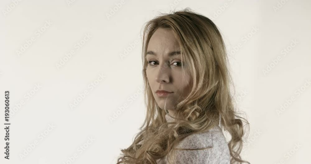 Portrait of beautiful blond woman with wool sweater Portrait of beautiful blond woman with wool sweater