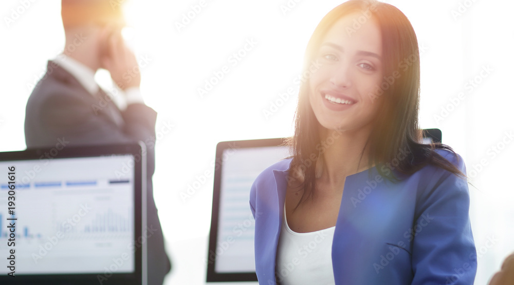 Young brunette businesswoman girl looking at camera Young brunette businesswoman girl looking at camera