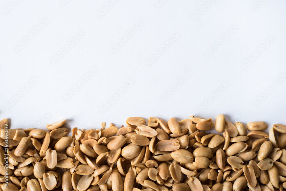 pile of fried peanut isolated on white background. background and advertising wallpaper concept pile of fried peanut isolated on white background. background and advertising wallpaper concept