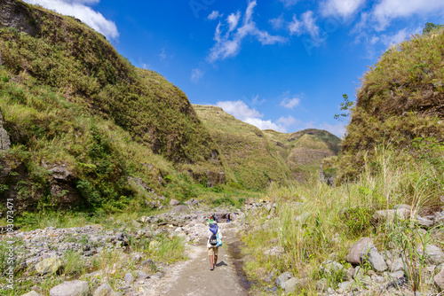 Tourists hiking Mount Pinatubo © bugking88
