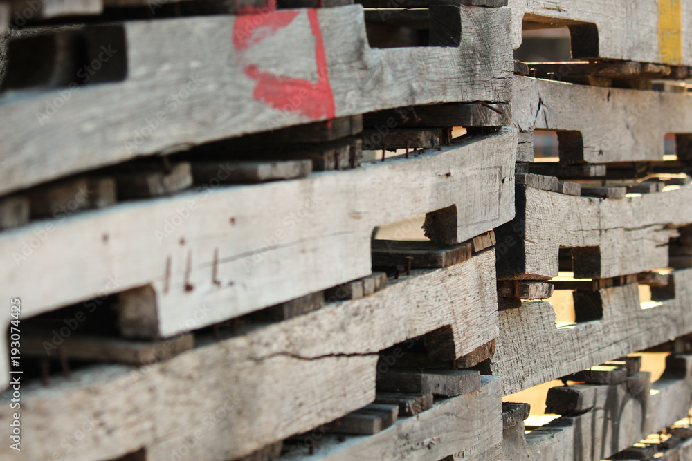 Stacks of weathered pallets