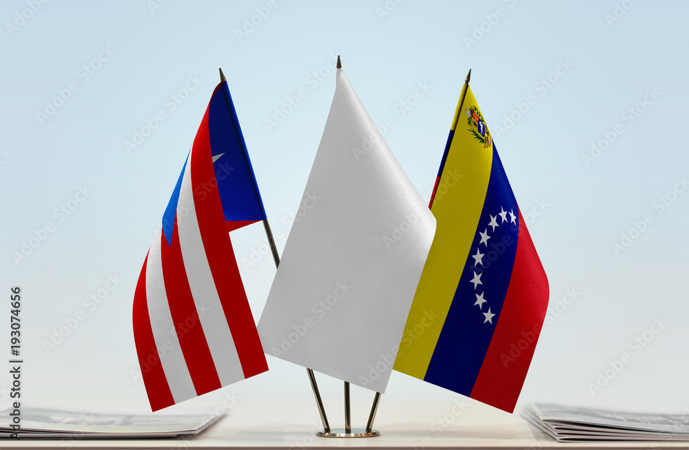 Flags of Puerto Rico and Venezuela with a white flag in the middle