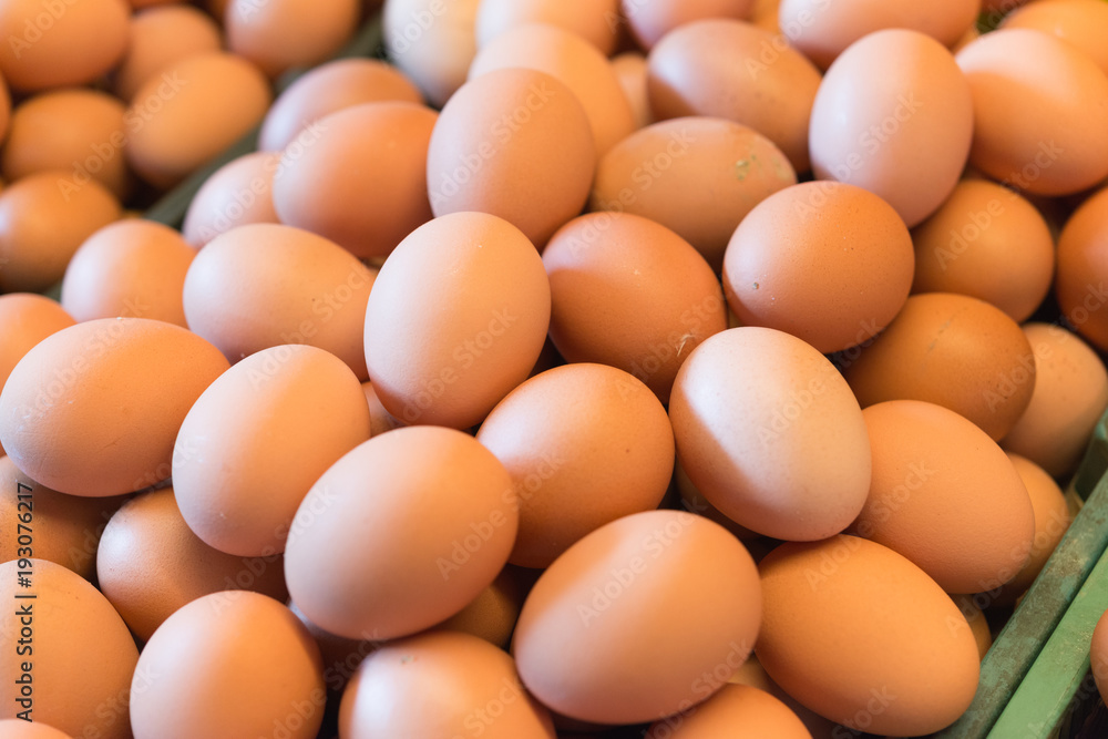 Background photo of pile fresh chicken eggs in the market. Background photo of pile fresh chicken eggs in the market.