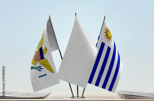 Flags of U.S. Virgin Islands and Uruguay with a white flag in the middle