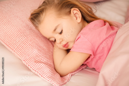 Cute little girl sleeping i...