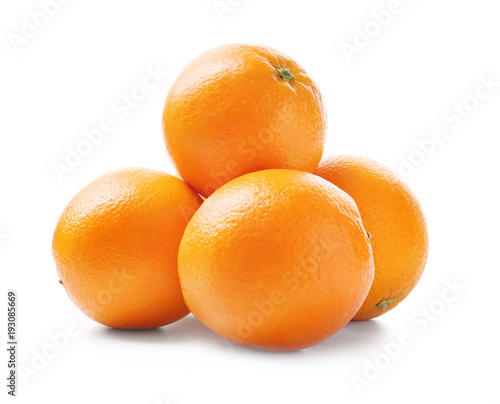 Juicy ripe oranges on white background