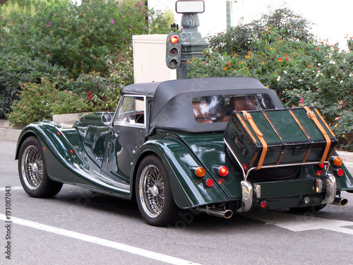 Retro car convertible Morgan stands at a traffic light in Monaco. Retro adventure. Europe. Mediterranean region. Monaco. December 2015. photo