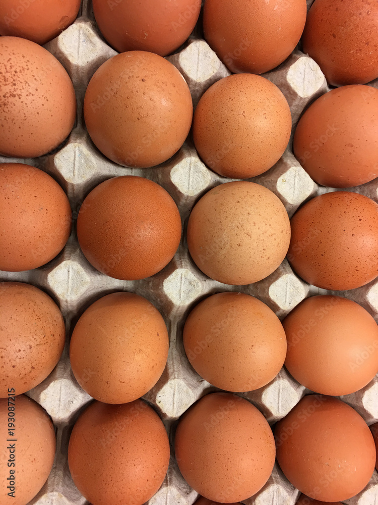 Fresh natural chicken eggs in cardboard packing. Fresh natural chicken eggs in cardboard packing.