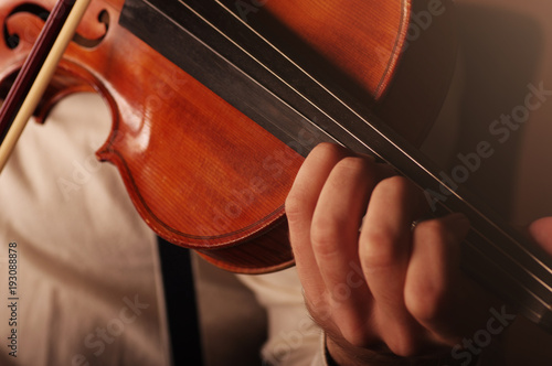 violin player playing his instrument