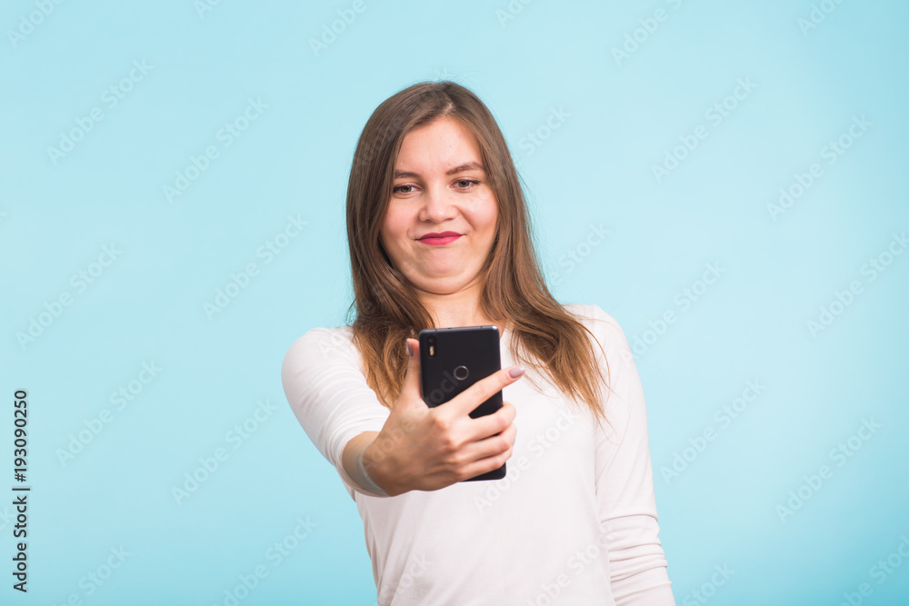 April fools day concept - fool crazy woman make selfie. happy expression April fools day concept - fool crazy woman make selfie. happy expression