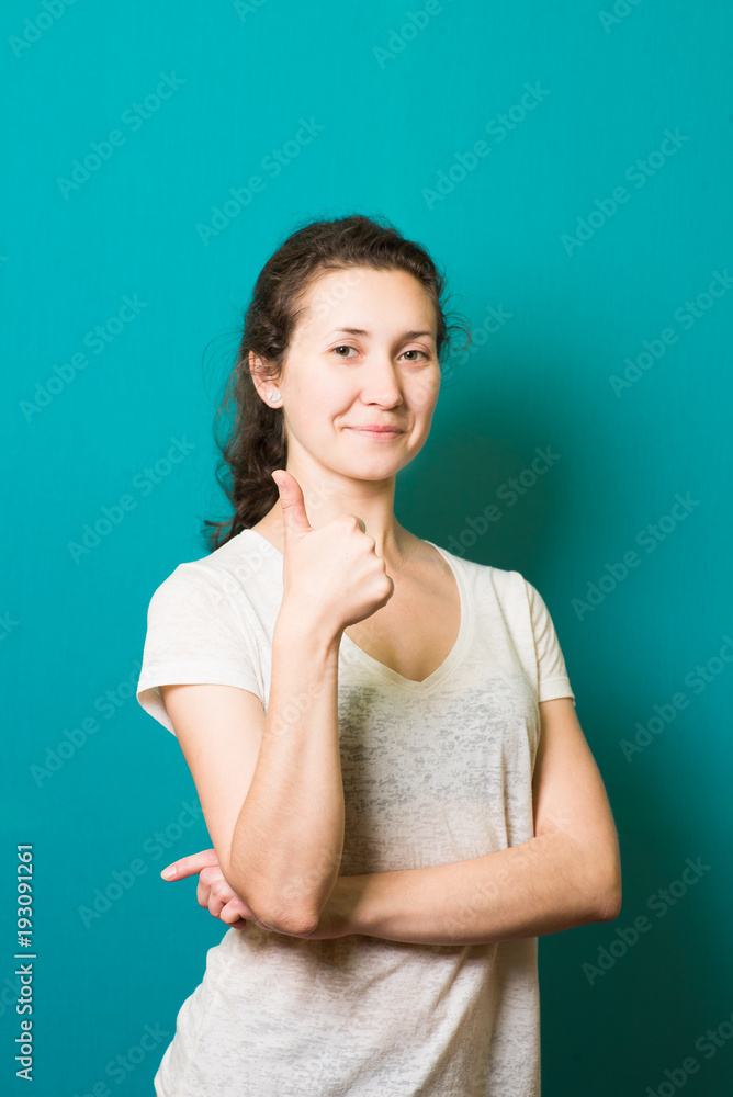 Girl showing thumb up, everything is OK Girl showing thumb up, everything is OK